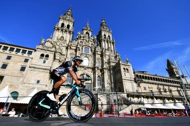 Robert Stannard of Australia and Team BikeExchange competes in the Plaza del Obradoiro with the Cathedral in the background during the 76th Tour of...