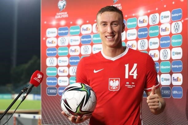 Adam Buksa of Poland poses with the matchball following his hat trick, during a press interview following the final whistle of the 2022 FIFA World...