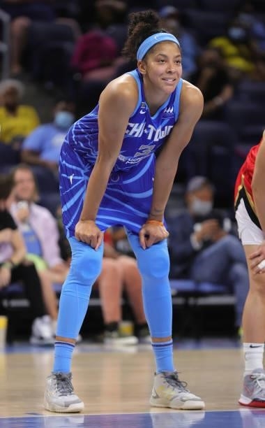 Candace Parker of the Chicago Sky smiles at a teammate as she wait for a foul shot by the Las Vegas Aces at Wintrust Arena on September 05, 2021 in...