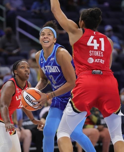 Candace Parker of the Chicago Sky shoots between Chelsea Gray and Kiah Stokes of the Las Vegas Aces at Wintrust Arena on September 05, 2021 in...