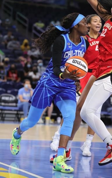 Kahleah Copper of the Chicago Sky passes around A'ja Wilson of the Las Vegas Aces at Wintrust Arena on September 05, 2021 in Chicago, Illinois. The...