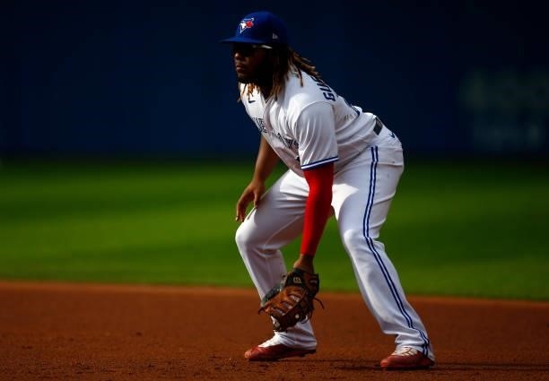 Vladimir Guerrero Jr. #13 of the Toronto Blue Jays fields during a MLB game against the Oakland Athletics at Rogers Centre on September 4, 2021 in...