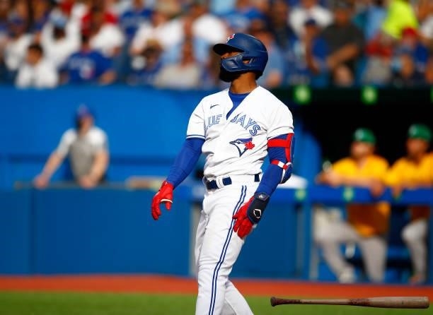 Teoscar Hernandez of the Toronto Blue Jays hits his 100th career home run during a MLB game against the Oakland Athletics at Rogers Centre on...