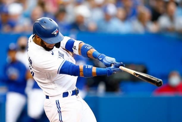 Lourdes Gurriel Jr. #13 of the Toronto Blue Jays bats during a MLB game against the Oakland Athletics at Rogers Centre on September 4, 2021 in...
