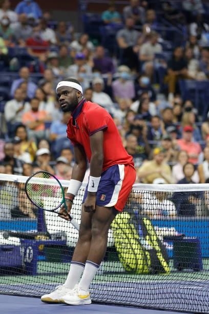 Frances Tiafoe of the United States reacts as he plays against Felix Auger-Aliassime of Canada during his Men’s Singles round of 16 match on Day...
