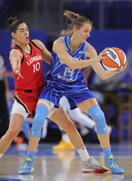Allie Quigley of the Chicago Sky controls the ball under pressure from Kelsey Plum of the Las Vegas Aces at Wintrust Arena on September 05, 2021 in...