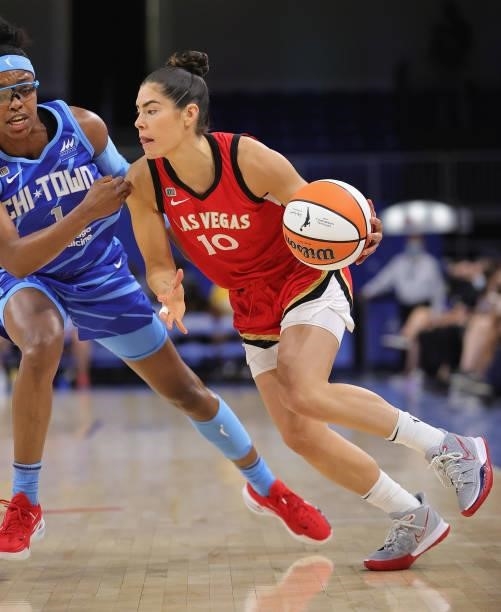 Kelsey Plum of the Las Vegas Aces moves against Diamond DeShields of the Chicago Sky at Wintrust Arena on September 05, 2021 in Chicago, Illinois....