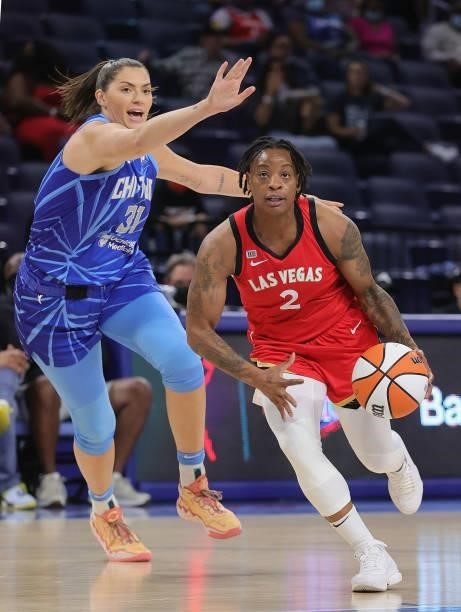 Riquna Williams of the Las Vegas Aces drives past Stefanie Dolson of the Chicago Sky at Wintrust Arena on September 05, 2021 in Chicago, Illinois....