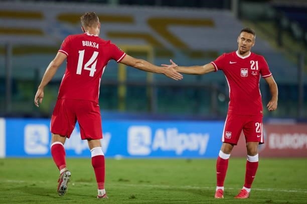 Adam Buksa of Poland celebrates after scoring during the 2022 FIFA World Cup Qualifier match between San Marino and Poland at San Marino Stadium on...
