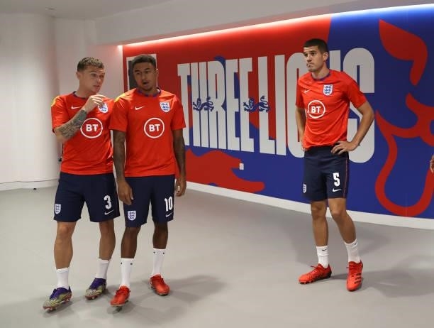 Kieran Trippier, Jesse Lingard and Conor Coady of England wait in the tunnel prior to the 2022 FIFA World Cup Qualifier match between England and...
