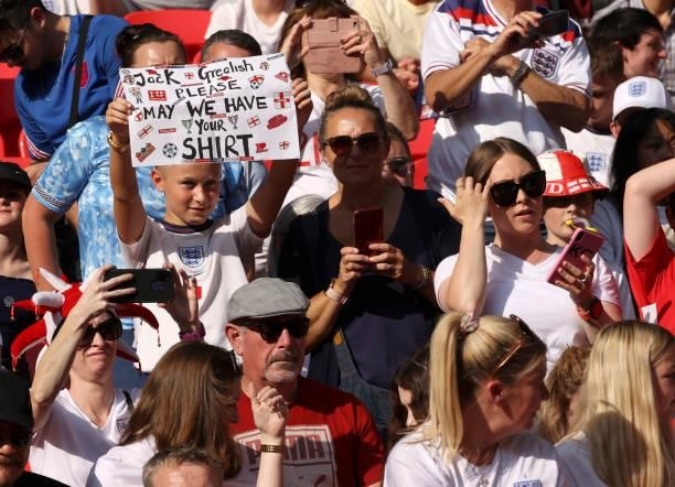 Fan holds a sign up asking for the shirt of Jack Grealish of England during the 2022 FIFA World Cup Qualifier match between England and Andorra at...