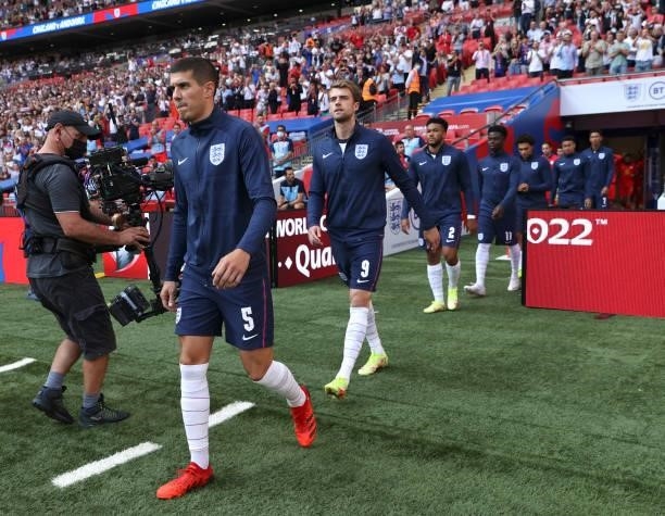 Conor Coady, Patrick Bamford of England and teammates walk onto the pitch prior to the 2022 FIFA World Cup Qualifier match between England and...