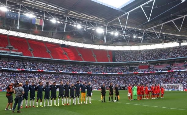 Players line up for the national anthems prior to the 2022 FIFA World Cup Qualifier match between England and Andorra at Wembley Stadium on September...