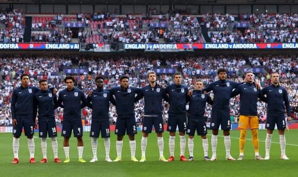 Players of England sing the national anthem prior to the 2022 FIFA World Cup Qualifier match between England and Andorra at Wembley Stadium on...