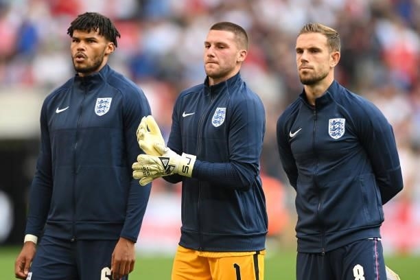 Tyrone Mings, Sam Johnstone and Jordan Henderson of England line up prior to the 2022 FIFA World Cup Qualifier match between England and Andorra at...