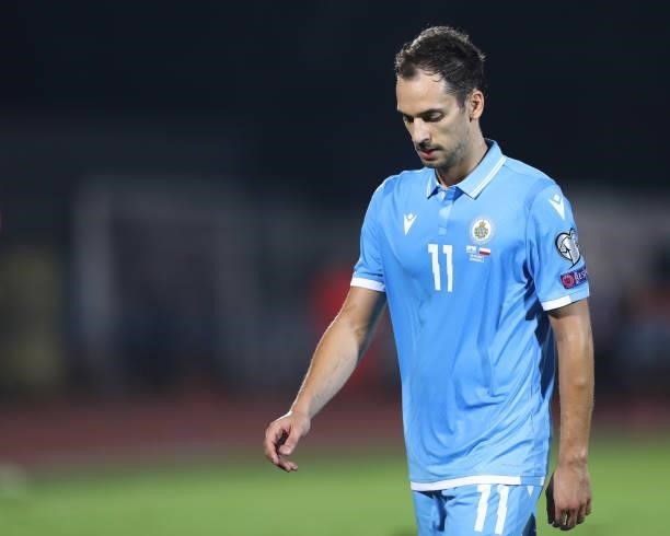 Cristian Brolli of San Marino bows his head as he leaves the field of play at the half time interval in the 2022 FIFA World Cup Qualifier match...