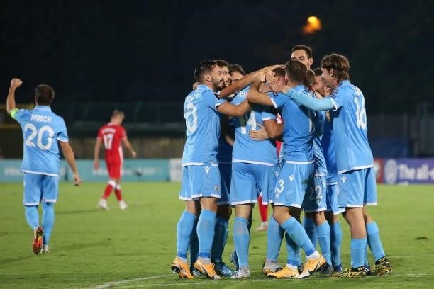 Nicola Nanni of San Marino celebrates with team mates after scoring to reduce the deficit to 4-1 during the 2022 FIFA World Cup Qualifier match...