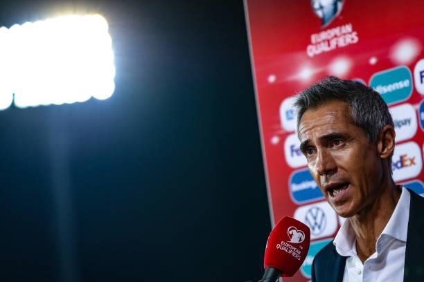 Paulo Sousa Head coach of Poland reacts during a press interview following the final whistle of the 2022 FIFA World Cup Qualifier match between San...