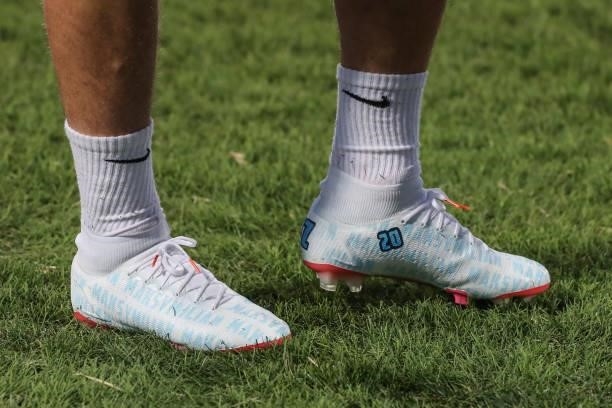 The personalised football boots of Piotr Zielinski of Poland are seen as he takes part in a training session after he was left out of the line up...