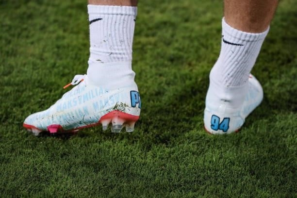 The personalised football boots of Piotr Zielinski of Poland are seen as he takes part in a training session after he was left out of the line up...