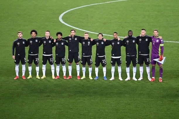 German team sings their national anthem prior to the 2022 FIFA World Cup Qualifier match between Germany and Armenia at Mercedes Benz Arena on...