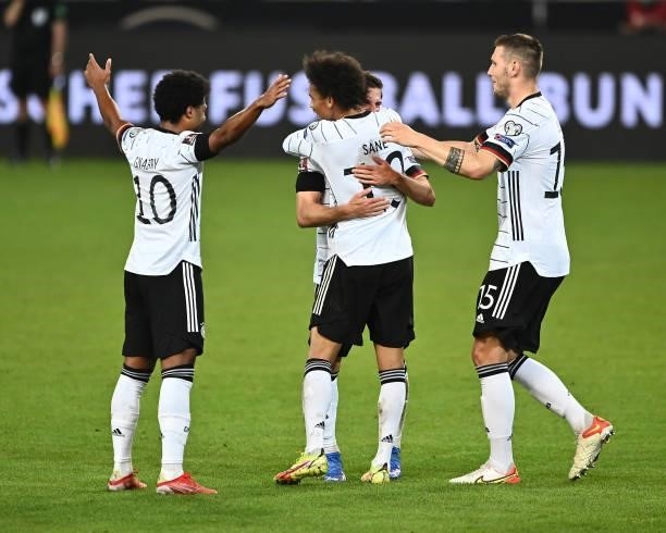 Serge Gnabry, Jonas Hofmann, Leroy Sane, Niklas Suele of Germany celebrates their team's fifth goal during the 2022 FIFA World Cup Qualifier match...