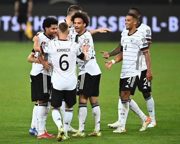Serge Gnabry, Joshua Kimmich, Leroy Sane, Thilo Kehrer of Germany celebrates their team's fifth goal during the 2022 FIFA World Cup Qualifier match...