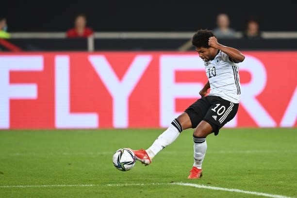 Serge Gnabry of Germany shoots during the 2022 FIFA World Cup Qualifier match between Germany and Armenia at Mercedes Benz Arena on September 05,...