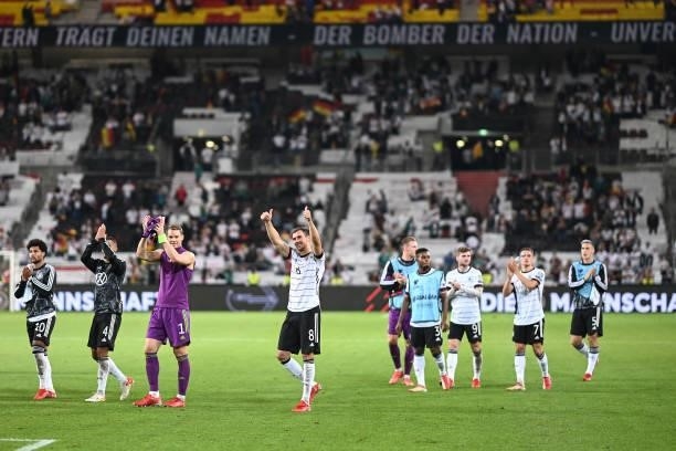 Serge Gnabry, Thilo Kehrer, Manuel Neuer and Leon Goretzka of Germany shows appreciation to the fans after the 2022 FIFA World Cup Qualifier match...