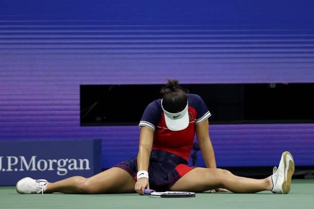 Bianca Andreescu of Canada sits on the ground after falling as she plays against Maria Sakkari of Greece during her Women’s Singles round of 16 match...