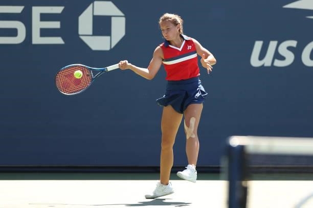 Matilda Mutavdzic of Great Britain returns against Lucija Ciric Bagaric of Croatia during her Girl’s Singles second round match on Day Nine of the...