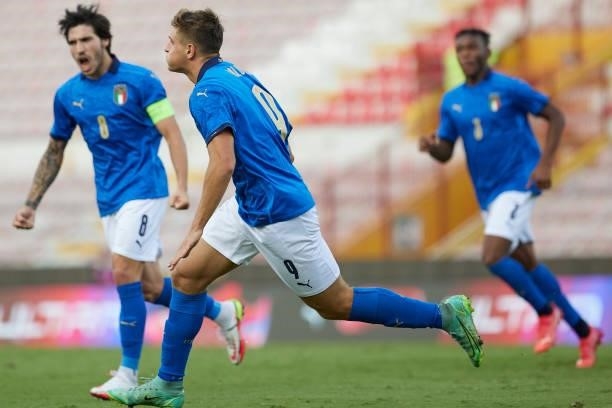 Lorenzo Colombo of Italy celebrates after scoring his team's first goal during the UEFA European Under-21 Championship Qualifier between Italy U21...