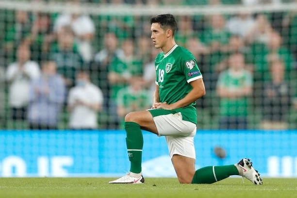 Jamie McGrath of Republic of Ireland takes a knee in support of the Black Lives Matter movement prior to the 2022 FIFA World Cup Qualifier match...