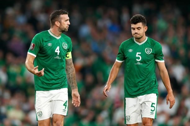 Shane Duffy of Republic of Ireland interacts with team mate John Egan during the 2022 FIFA World Cup Qualifier match between Republic of Ireland and...