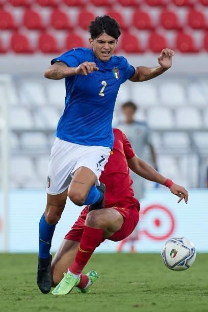Raoul Bellanova of Italy battle for the ball during the UEFA European Under-21 Championship Qualifier between Italy U21 and Montenegro U21 at Stadio...