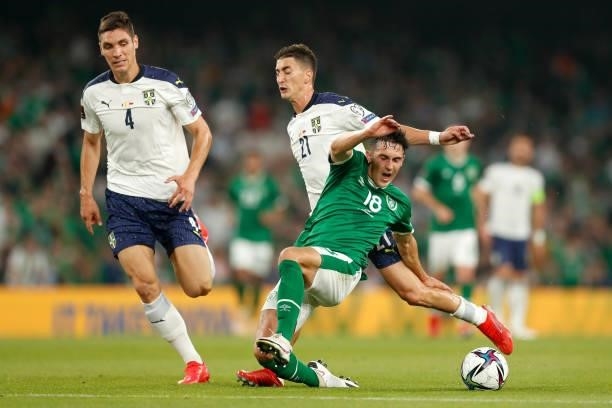 Jamie McGrath of Republic of Ireland is challenged by Filip Djuricic of Serbia during the 2022 FIFA World Cup Qualifier match between Republic of...