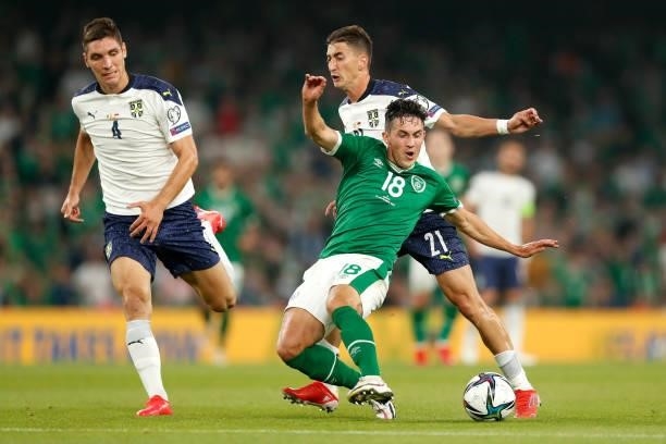 Jamie McGrath of Republic of Ireland is challenged by Filip Djuricic of Serbia during the 2022 FIFA World Cup Qualifier match between Republic of...