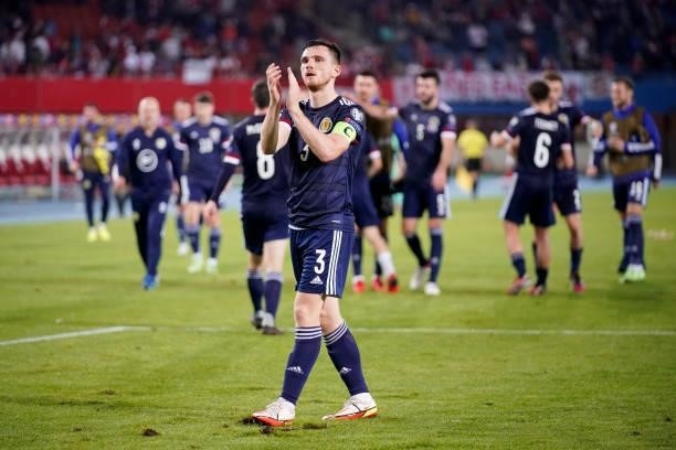 Andy Robertson of Scotland applauds the fans following their side's victory after the 2022 FIFA World Cup Qualifier match between Austria and...