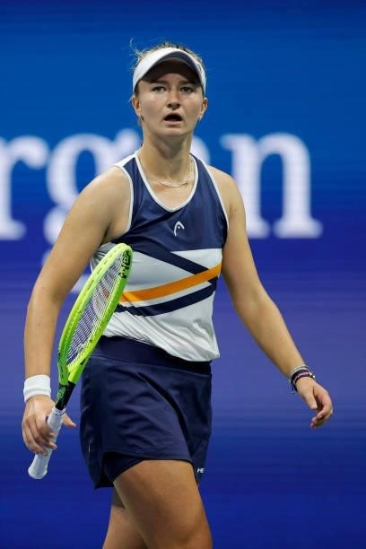 Barbora Krejcikova of Czech Republic reacts against Aryna Sabalenka of Belarus during her Women's Singles quarterfinals match on Day Nine of the 2021...