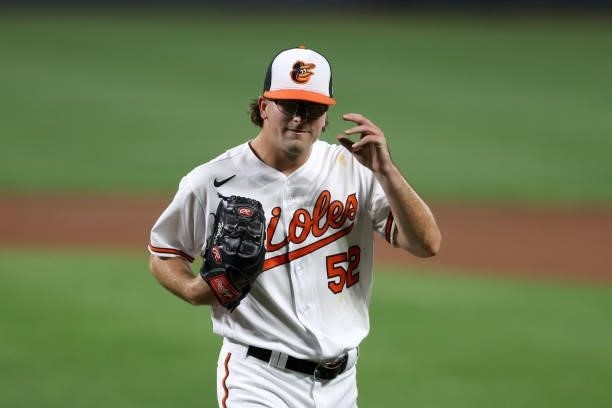 Starting pitcher Alexander Wells walks off the mound after retiring the side against the Kansas City Royals batter in the third inning at Oriole Park...