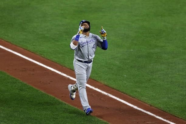 Carlos Santana of the Kansas City Royals celebrates after hitting a solo home run against the Baltimore Orioles in the fourth inning at Oriole Park...