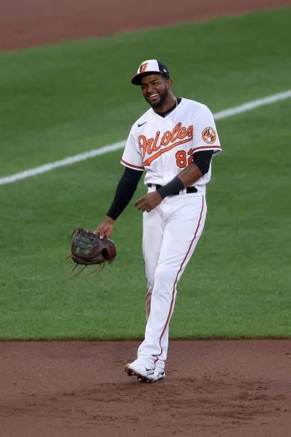 Third baseman Kelvin Gutierrez of the Baltimore Orioles laughs between pitches against the Kansas City Royals at Oriole Park at Camden Yards on...