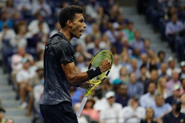 Felix Auger-Aliassime of Canada reacts against Carlos Alcaraz of Spain during his Men’s Singles quarterfinals match on Day Nine of the 2021 US Open...