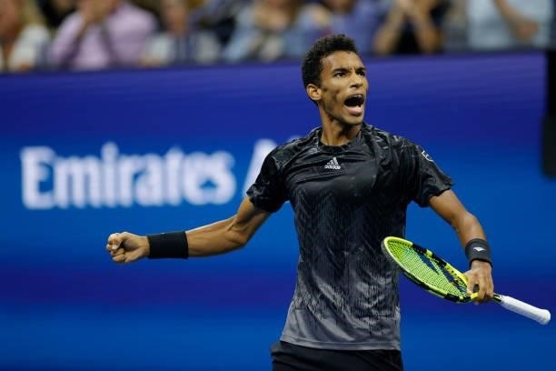 Felix Auger-Aliassime of Canada reacts against Carlos Alcaraz of Spain during his Men’s Singles quarterfinals match on Day Nine of the 2021 US Open...