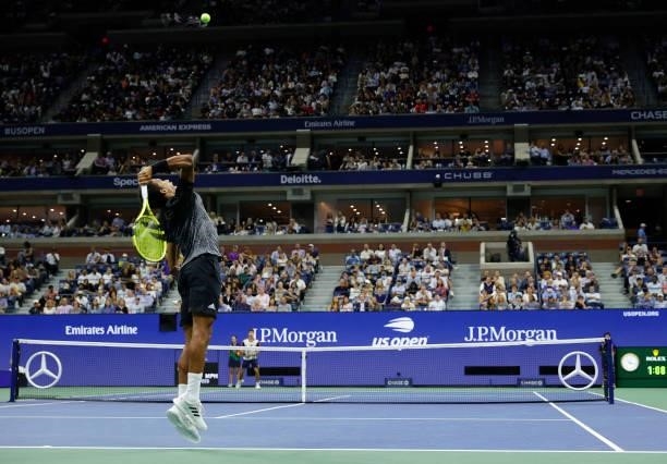 Felix Auger-Aliassime of Canada serves against Carlos Alcaraz of Spain during his Men’s Singles quarterfinals match on Day Nine of the 2021 US Open...