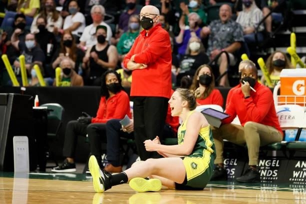 Katie Lou Samuelson of the Seattle Storm reacts after a foul on her three point basket against the Washington Mystics during the third quarter at...
