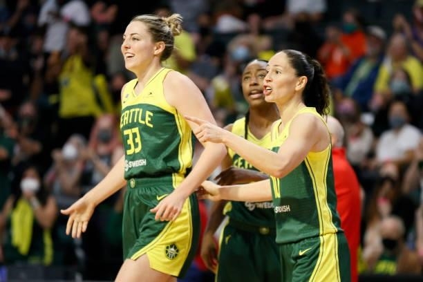 Katie Lou Samuelson and Sue Bird of the Seattle Storm react during the third quarter against the Washington Mystics at Angel of the Winds Arena on...