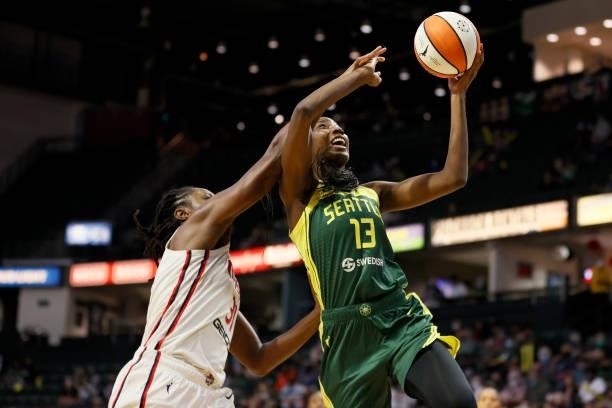 Ezi Magbegor of the Seattle Storm shoots against Tina Charles of the Washington Mystics during the third quarter at Angel of the Winds Arena on...