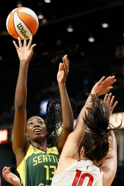Ezi Magbegor of the Seattle Storm shoots against Megan Gustafson of the Washington Mystics during the fourth quarter at Angel of the Winds Arena on...