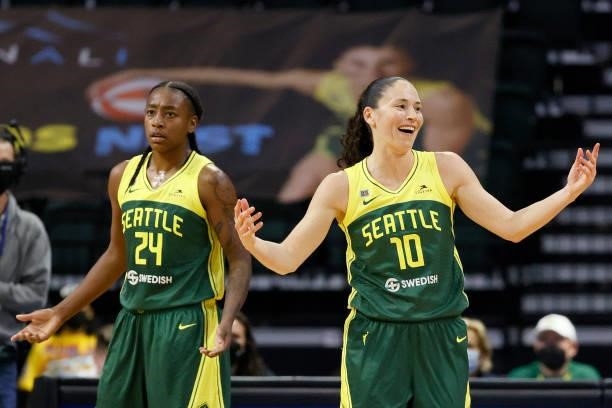 Jewell Loyd and Sue Bird of the Seattle Storm react during the second quarter against the Washington Mystics at Angel of the Winds Arena on September...